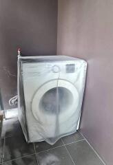 Washing machine in laundry area