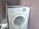 Washing machine in laundry area