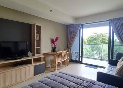 Spacious living room with balcony view