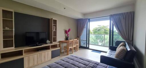 Spacious living room with balcony view