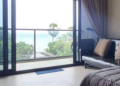 Bedroom with ocean view and balcony