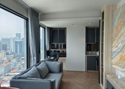 Modern living room with city view, grey sofa