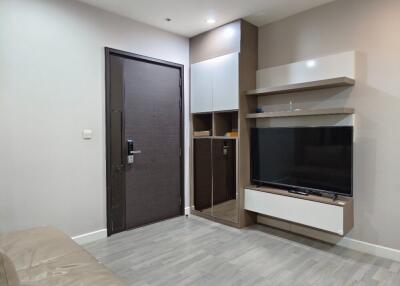 Modern living room with TV and storage