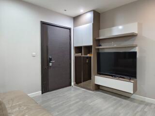 Modern living room with TV and storage