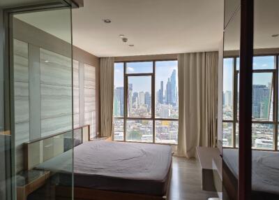 Bedroom with a city view