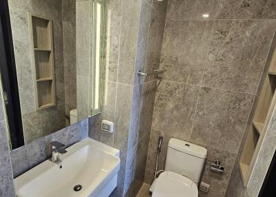 Modern bathroom with sink and toilet