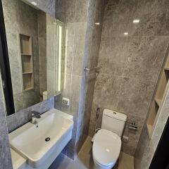 Modern bathroom with sink and toilet