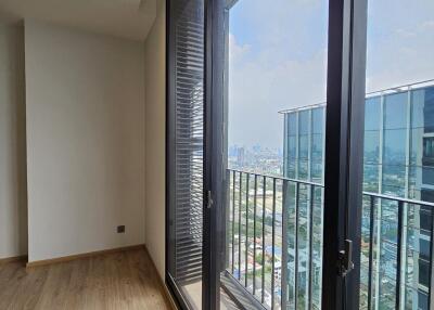 View of balcony with large glass doors