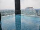 Rooftop infinity pool with a city view