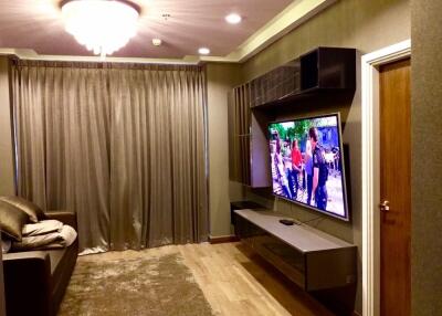 Modern living room with wall-mounted TV