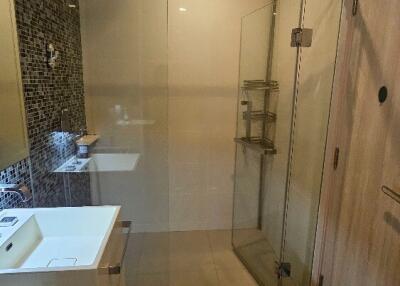 Modern bathroom with glass shower enclosure