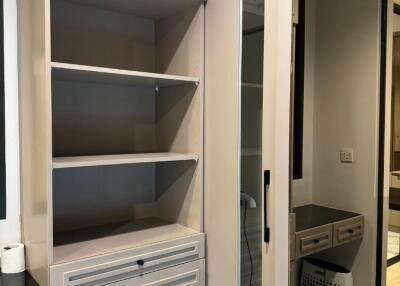 Bedroom with closet and shelving