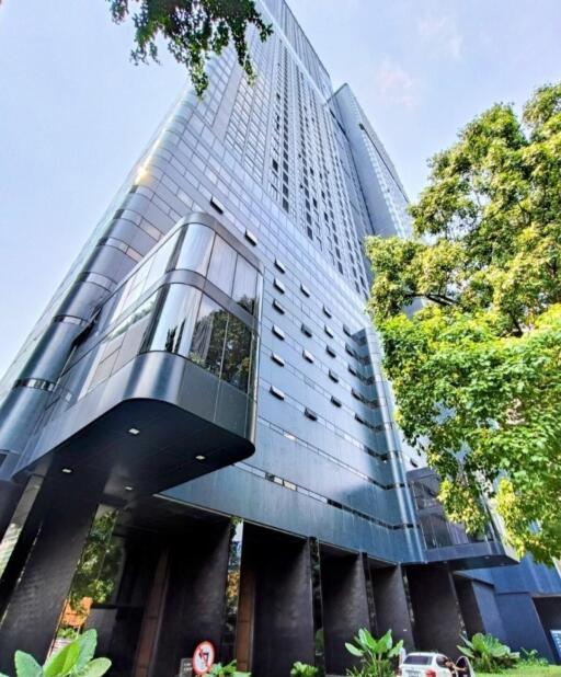 Modern high-rise building exterior with glass and metal facade