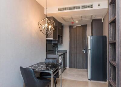 Modern kitchen with dining area and black counter