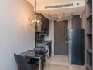 Modern kitchen with dining area and black counter