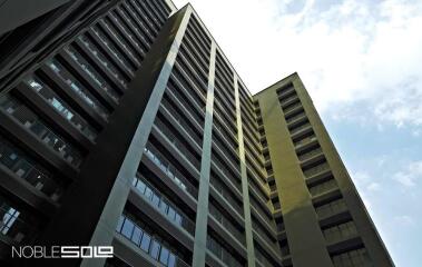 Exterior view of a high-rise residential building