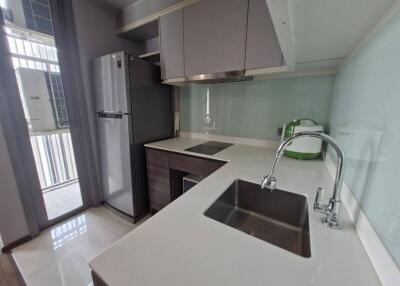 Modern kitchen with stainless steel appliances and ample counter space