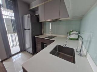 Modern kitchen with stainless steel appliances and ample counter space