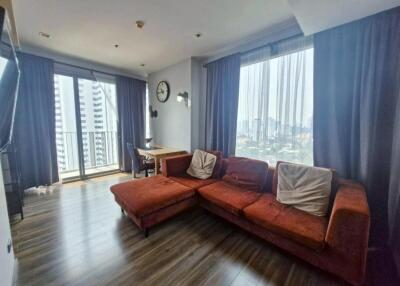 Spacious living room with a large window view