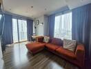 Spacious living room with a large window view