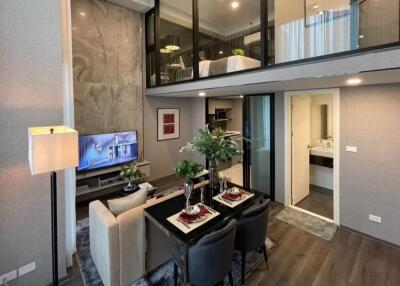 Modern living area with mezzanine and dining space