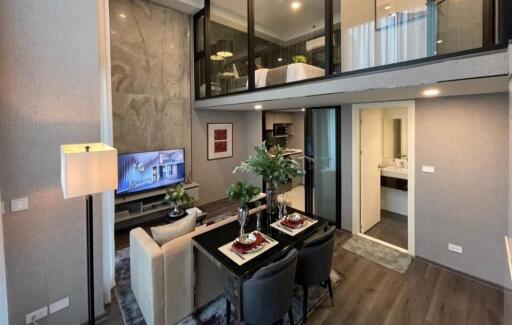 Modern living area with mezzanine and dining space