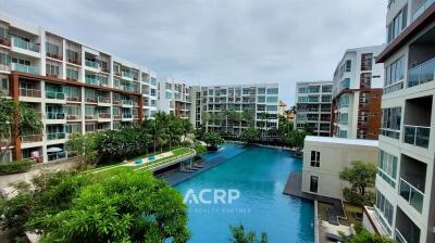 Apartment complex with a large swimming pool