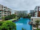 Apartment complex with a large swimming pool