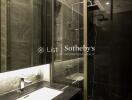 Modern bathroom with glass shower and sleek design