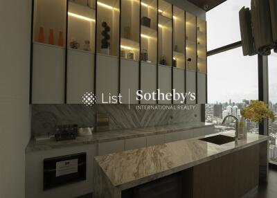 Modern kitchen with stylish cabinets and city view