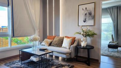 Modern living room with decor and natural light