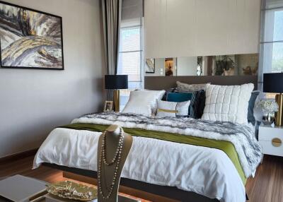 Modern, well-decorated bedroom with elegant furnishings