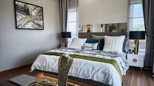 Modern, well-decorated bedroom with elegant furnishings