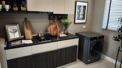 Modern kitchen with washing machine