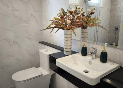 Modern bathroom with sink and toilet