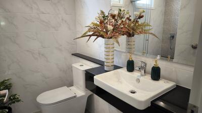 Modern bathroom with sink and toilet