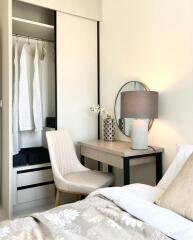 Cozy bedroom with wardrobe and dressing table