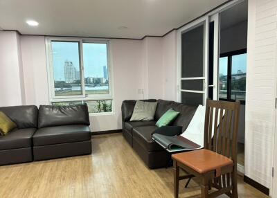 Living room with sofa and city view