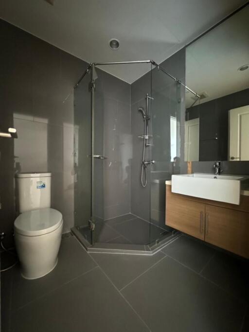 Modern bathroom with glass shower and vanity