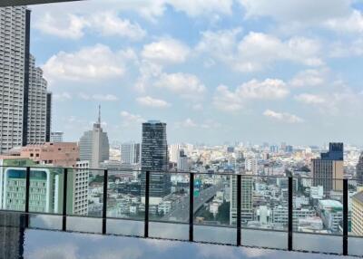 Rooftop view with skyline and pool