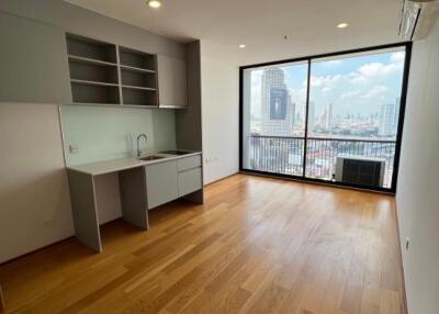 Modern living room with large window and city view