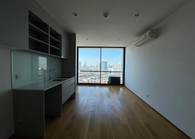 Modern living area with large window and city view