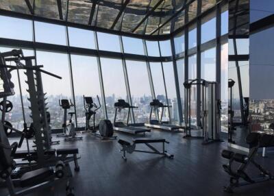 Modern fitness center with a city view