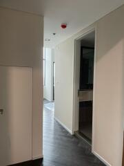 Modern hallway with sleek flooring and light walls