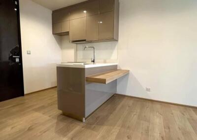 Modern kitchen with wooden flooring