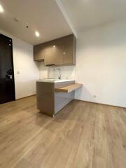 Modern kitchen with wooden flooring