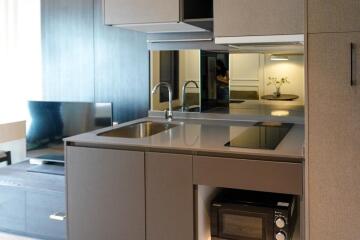 Modern compact kitchen with appliances