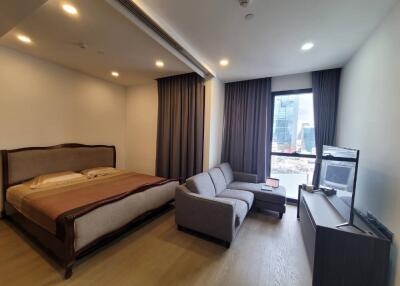 Modern bedroom with living area