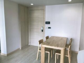 Dining area with a wooden table and chairs