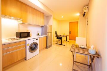 Modern kitchen area with dining workspace